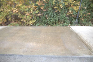 Sidewalk concrete treated with Pentra-Pel SI
